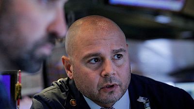 U.S. stocks, bond yields slip on report against Trump