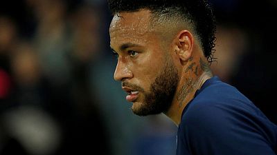 Neymar revisits Barcelona, but only for a legal dispute
