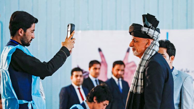 Afghan presidential vote held in relative calm, but turnout low