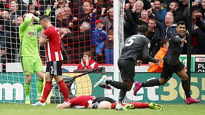 Liverpool march on, Man City keep up chase Liverpool march on, Man City keep up chase