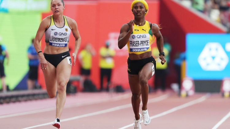 Yellow hair and hot time have Fraser-Pryce in spotlight