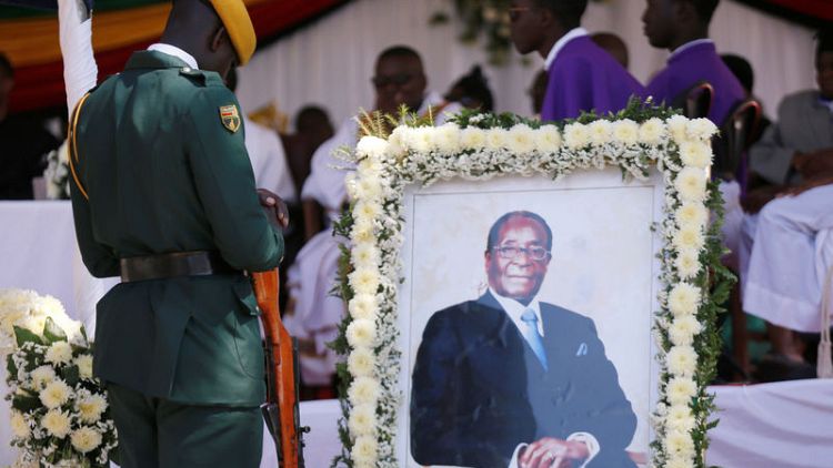 Zimbabwe's Mugabe buried in home village, ending an era