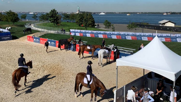 Horses take the ferry for show-jumping event on New York island