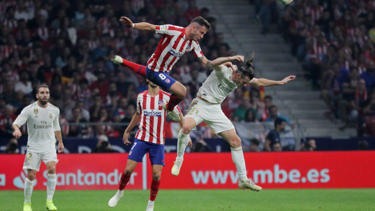 Real top La Liga after Madrid derby draw at Atletico