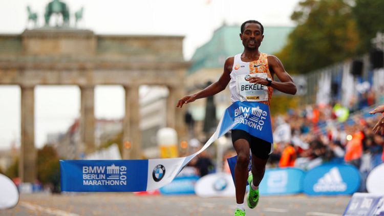 Bekele narrowly misses world record in Berlin marathon win