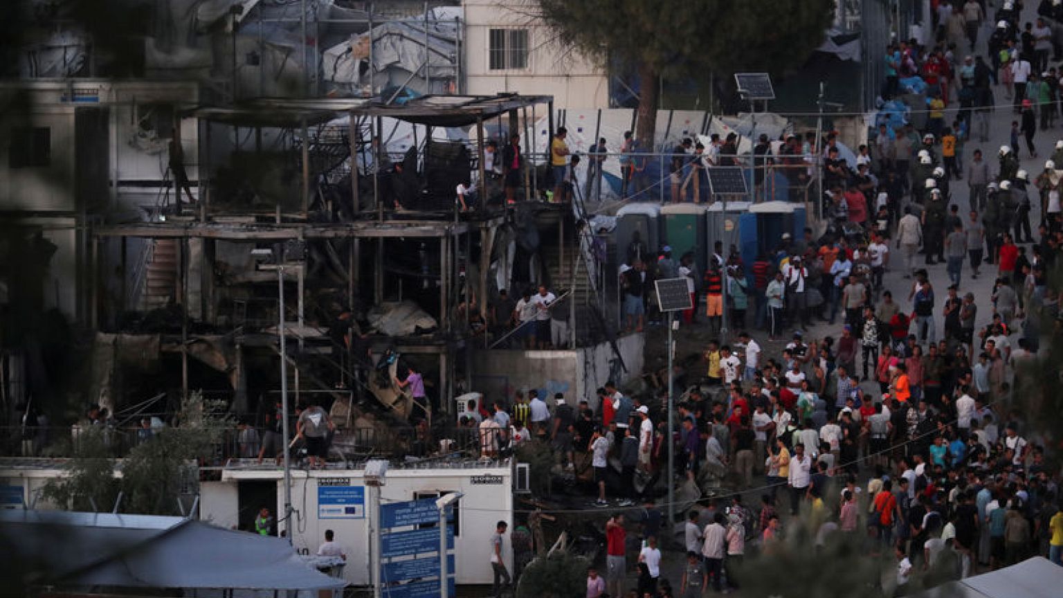 Fire, clashes, one dead at crowded Greek migrant camp on Lesbos