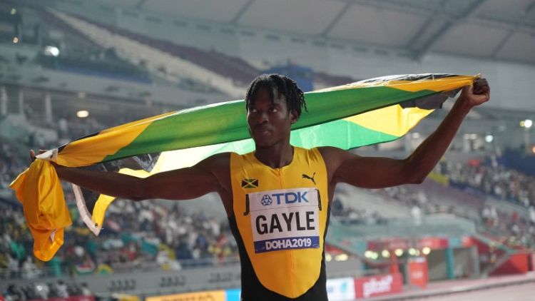 New champion Gayle can go on to break long jump world record, coach says