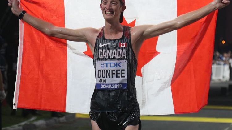 Race walking medallists upset at plans to ditch 50 kilometre event