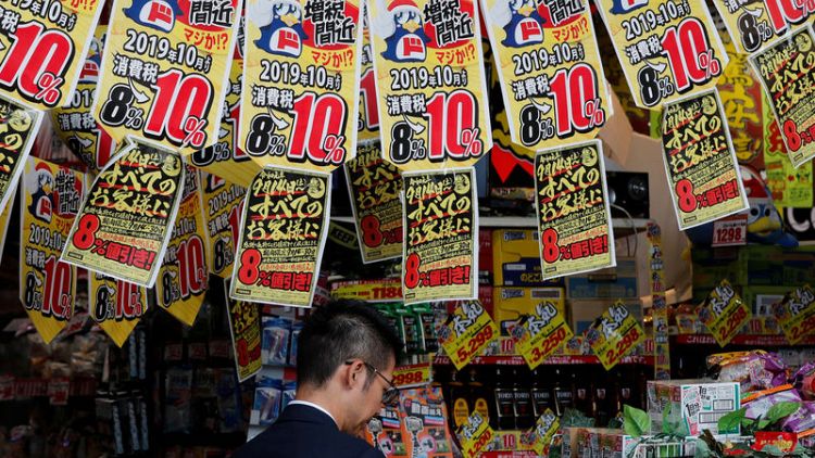 Japan proceeds with twice-delayed sales tax hike as growth sputters