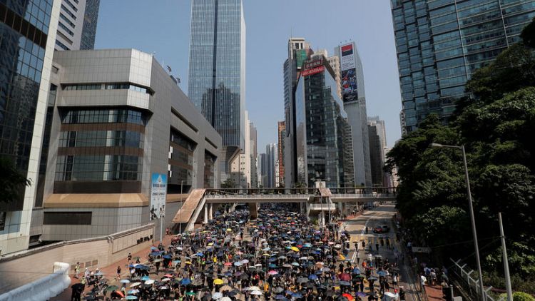Protesters flood Hong Kong's streets on Communist China's birthday