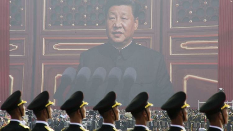 China's Xi says country will stay on path of peaceful development