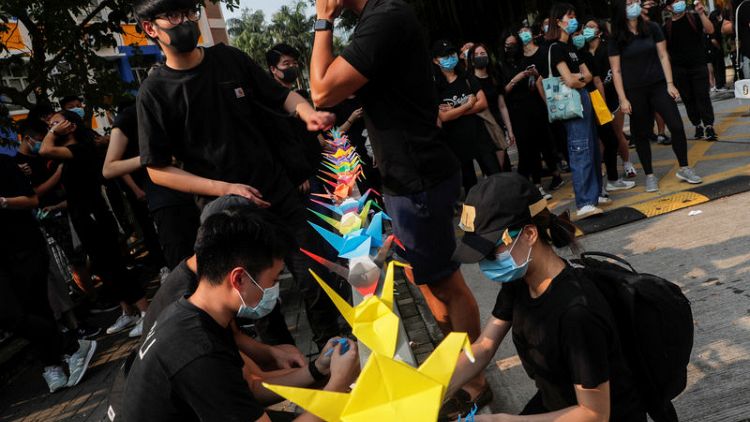 'This means war' - anger and division at school of student shot by Hong Kong police