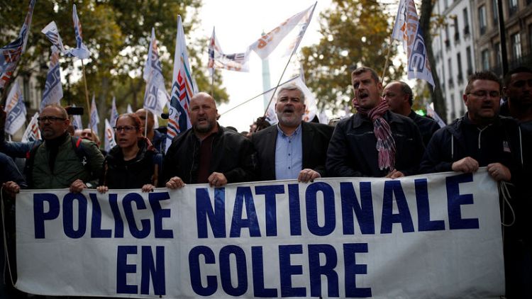French police march in Paris for better working conditions