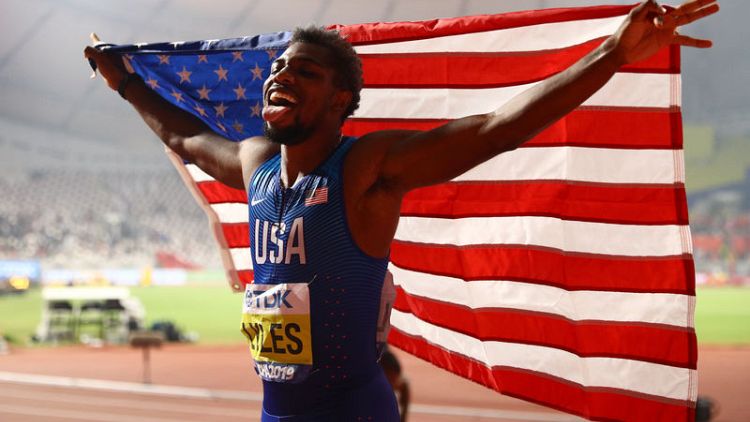 Athletics: Lyles beats asthma and the blues to conquer the world