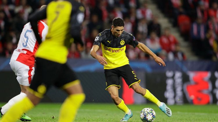 Hakimi double fires Dortmund to victory over Slavia
