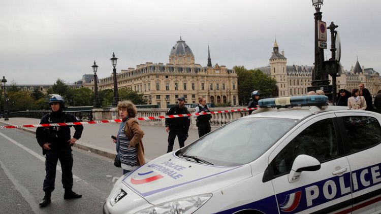 Attacker fatally stabs officer in Paris police station, is then shot dead