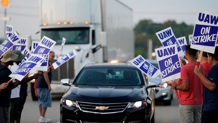 UAW cites 'significant progress' in Ford talks as GM strike continues