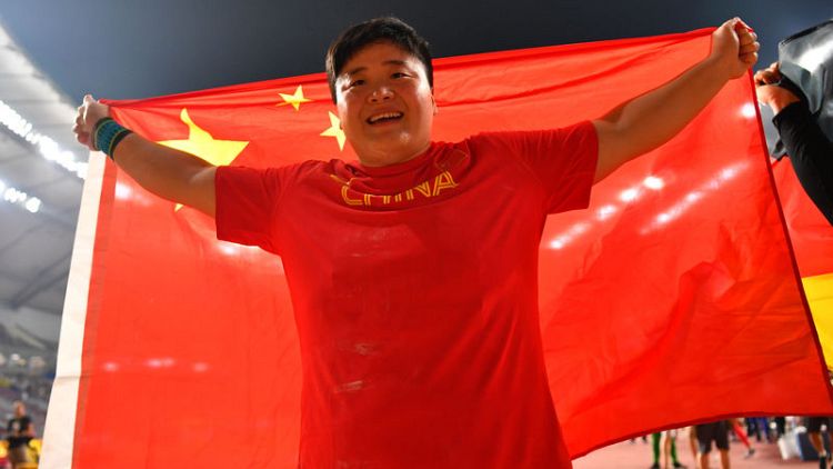 China's Gong retains shot put title by eight cm