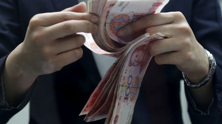 China's yuan to slip to new decade lows as trade war drags on: Reuters poll