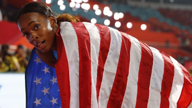 American Muhammad breaks own world record to win 400m hurdles