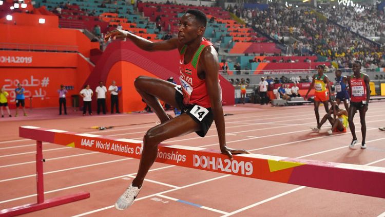Kipruto wins photo finish to claim steeplechase gold