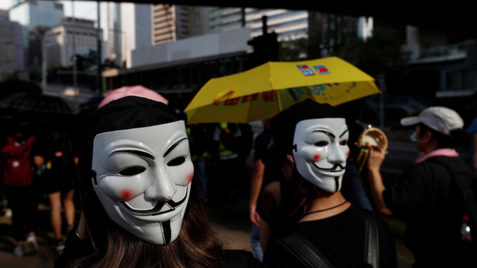 Hundreds return to Hong Kong streets as metro, shops shut after violence