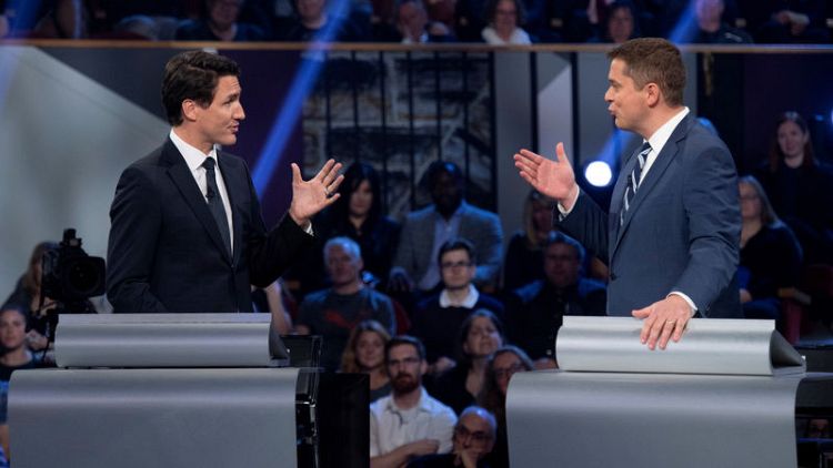 Main Canadian opposition leader slams PM Trudeau as a fraud in key election debate