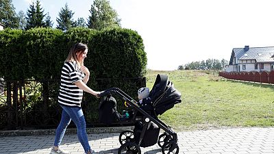 Poland's ruling right-wing party banks on child subsidy to win election Poland's ruling right-wing party banks on child subsidy to win election
