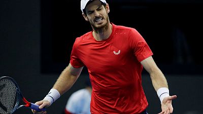 Murray wobbles but roars back to win Shanghai opener Murray wobbles but roars back to win Shanghai opener