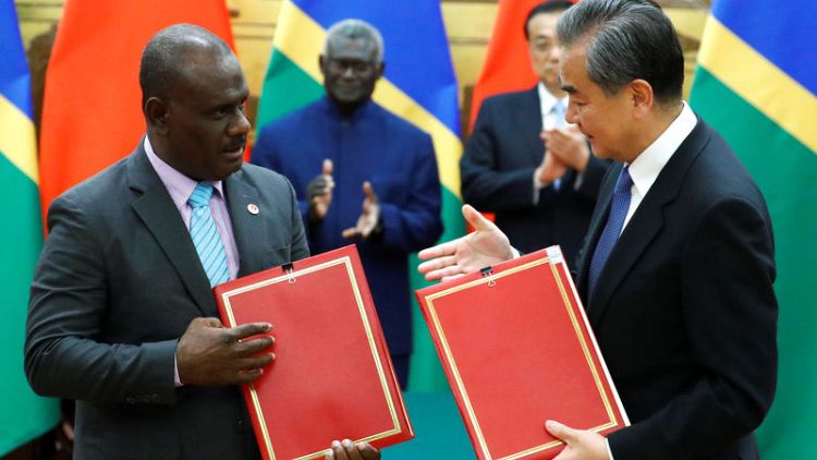 China, Solomon Islands sign deals under new diplomatic ties