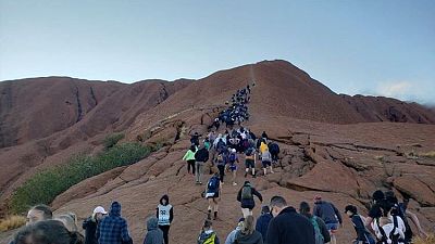 Thousands rush to climb Australia's Uluru ahead of ban Thousands rush to climb Australia's Uluru ahead of ban
