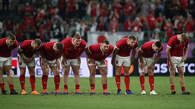 Brilliant Adams grabs hat-trick as battered Wales reach quarters Brilliant Adams grabs hat-trick as battered Wales reach quarters