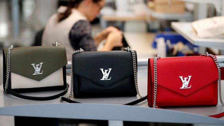 Vuitton owner LVMH shrugs off Hong Kong hit with third quarter sales beat