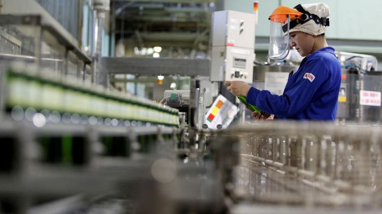 Japan manufacturers' outlook less negative, service sector up - Reuters Tankan