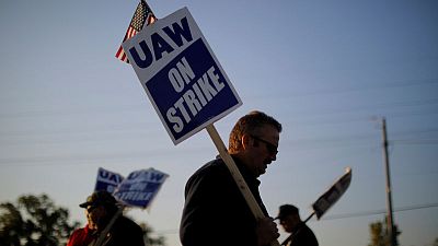 As GM workers picket, Michigan's economy feels the chill As GM workers picket, Michigan's economy feels the chill