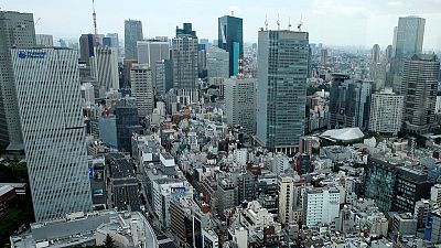 Japan firms see 'Abenomics' sputtering, tax hike hurting economy - Reuters poll Japan firms see 'Abenomics' sputtering, tax hike hurting economy - Reuters poll