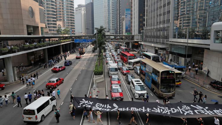 Hundreds take to Hong Kong streets ahead of weekend protests