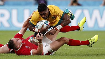 Australia outlast Georgia to stumble into the knockout stages Australia outlast Georgia to stumble into the knockout stages