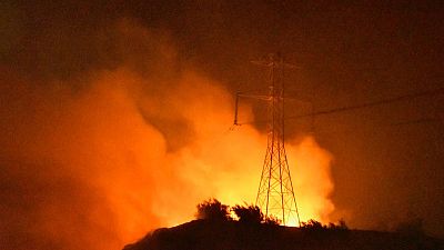 Burning trash sparked wildfire that destroyed dozens of homes in California - fire dept Burning trash sparked wildfire that destroyed dozens of homes in California - fire dept