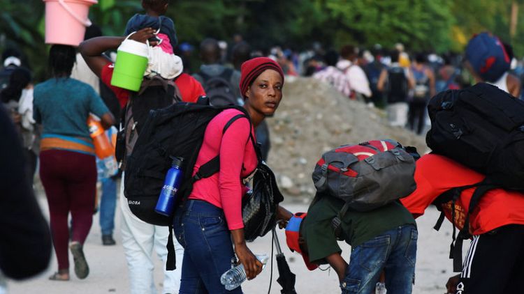 In southern Mexico, migrants gather in caravan aiming to reach U.S