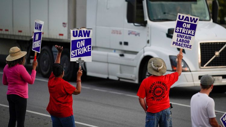 UAW boosts strike pay as GM walkout continues