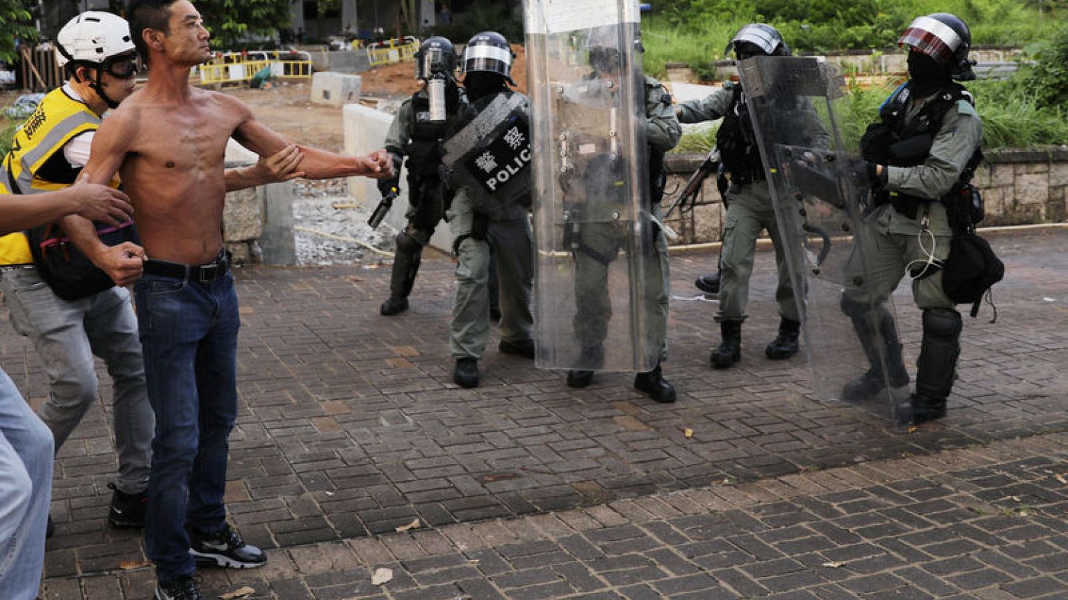 Hong Kong protesters, police in chaotic clashes, as metro, shops targeted