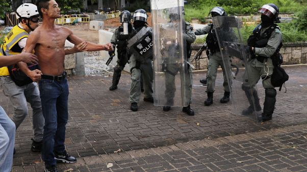 Hong Kong protesters, police in chaotic clashes, as metro, shops targeted Hong Kong protesters, police in chaotic clashes, as metro, shops targeted