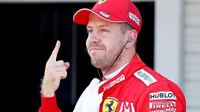 Vettel leads Ferrari front row lockout in Suzuka Vettel leads Ferrari front row lockout in Suzuka