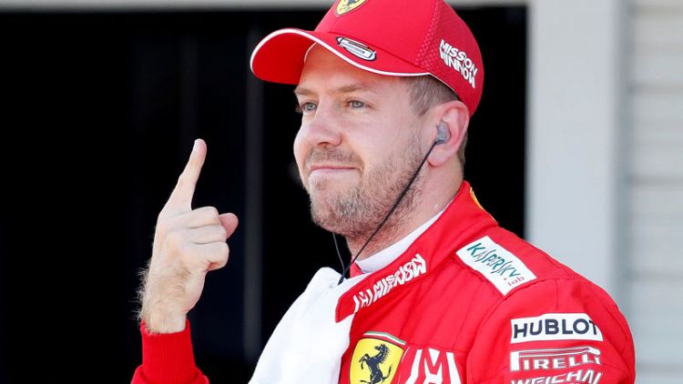 Vettel leads Ferrari front row lockout in Suzuka