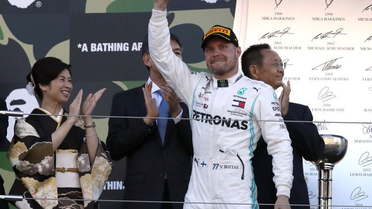 Bottas wins in Japan, Mercedes confirm sixth double title in a row