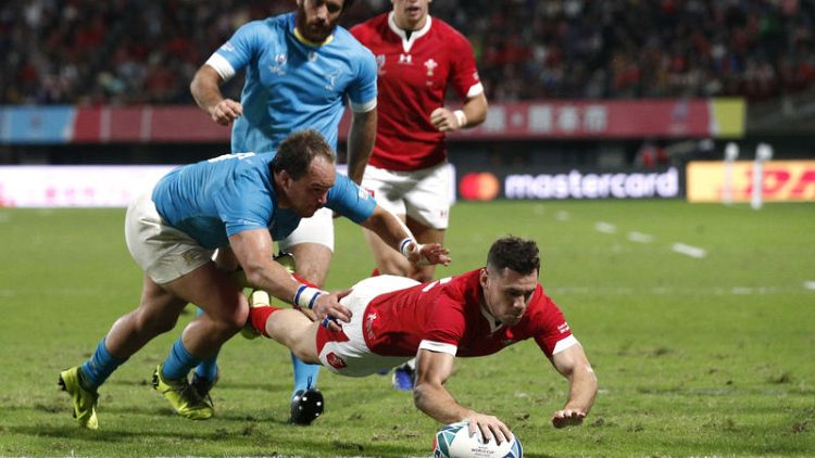Scrappy Wales make hard work of Uruguay to reach quarters
