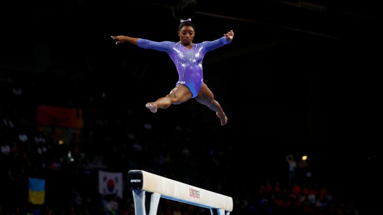 American Biles wins record 24th medal at worlds