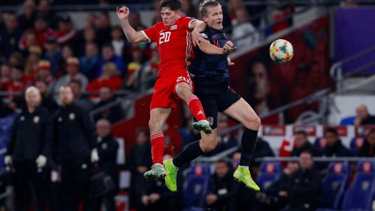 Wales hold Croatia to keep Euro 2020 hopes alive
