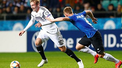 Gundogan powers Germany to victory after Can sees red Gundogan powers Germany to victory after Can sees red
